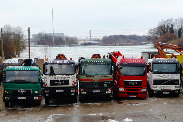 Bild mit fünf Fahrzeugen von Transporte Utzinger in München